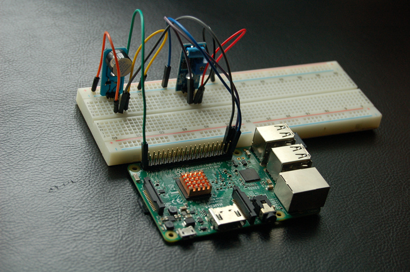 Design a smart alarm system through a raspberry pi board with vibration sensor and buzzer alarm sensor